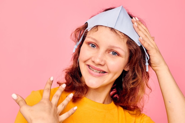 Funny girl protective medical mask fun posing fashion cropped view unaltered