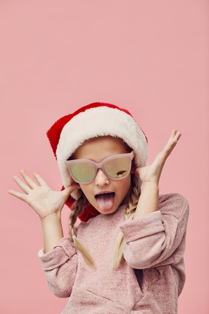 Funny girl in Santa hat