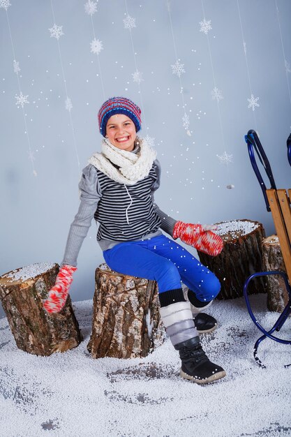 Funny girl in winter clothes