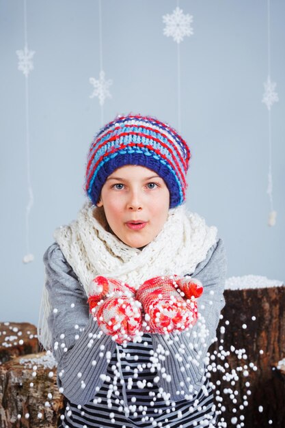 Funny girl in winter clothes