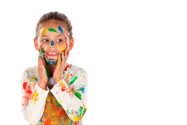 Funny girl with hands and face full of paint