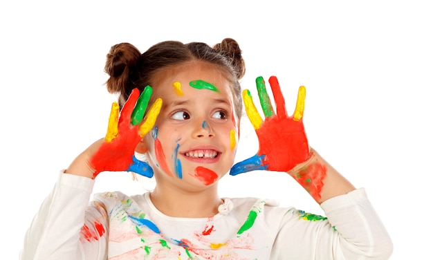 Foto ragazza divertente con le mani e la faccia piena di vernice