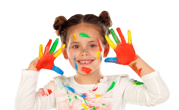 Funny girl with hands and face full of paint