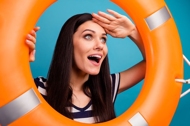 funny lady look inside emergency life buoy open mouth