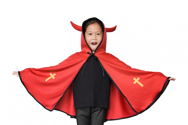 Funny little Asian child girl dressed in Halloween costume