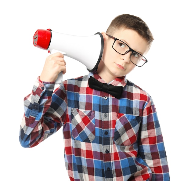 Funny little boy with megaphone on white 