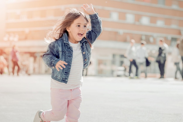 Funny little girl outdoors