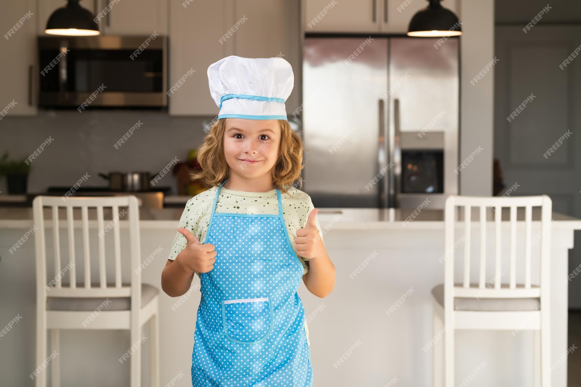 Smiling Kids In Cook's Uniform Making Bakery Dough With Flour And Eggs In  The Kitchen Stock Photo, Picture and Royalty Free Image. Image 60681329.