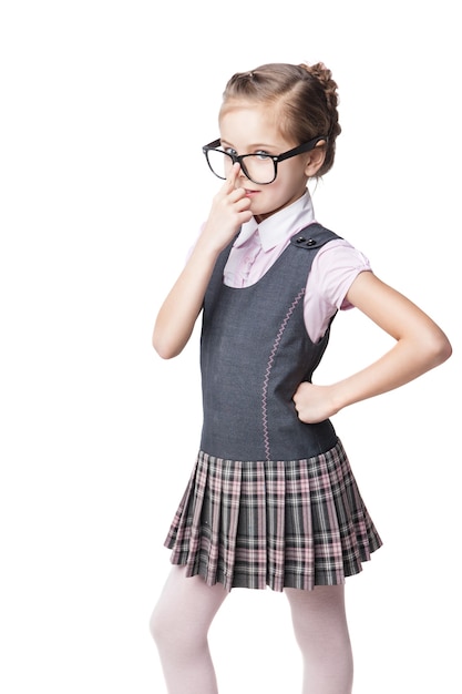 Funny little schoolgirl in glasses