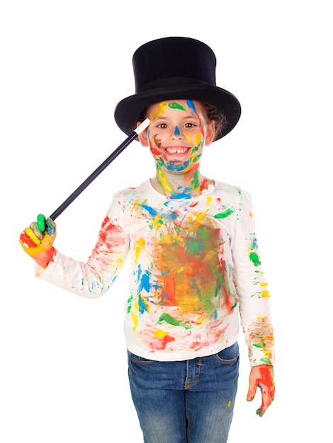 Funny magician with hands and face full of paint