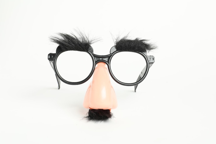 Photo funny mask with fake mustache nose and glasses on white background