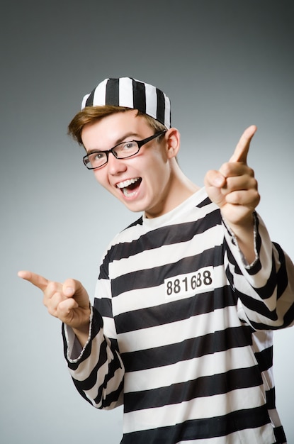 Photo funny prisoner in prison concept