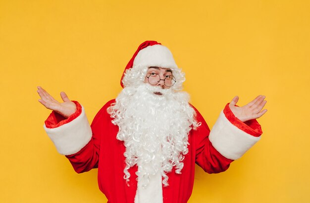 Funny Santa Claus on a yellow background