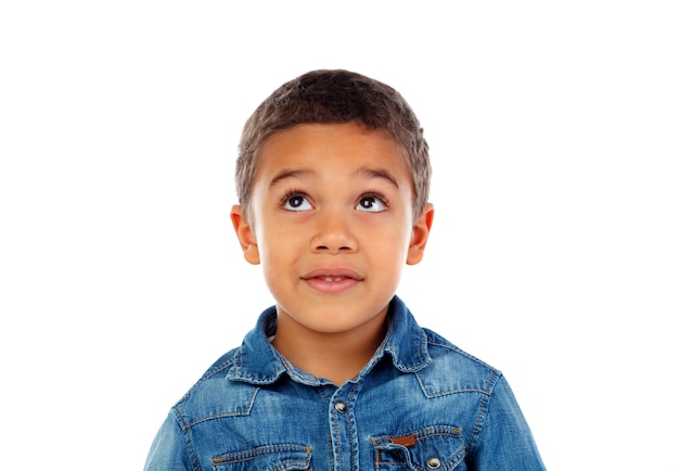 Funny small child with dark hair and black eye