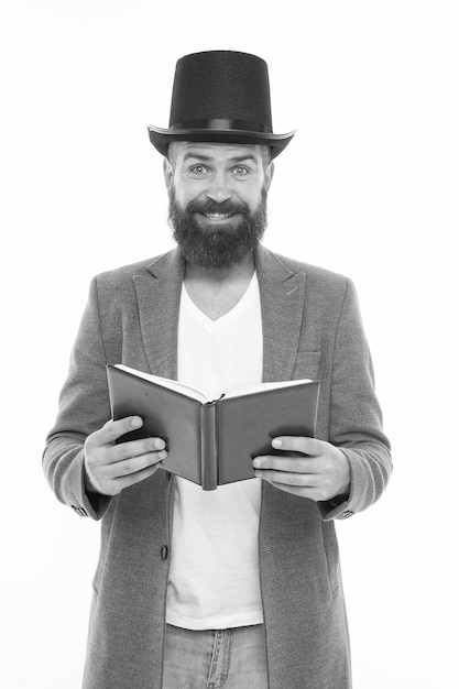 Photo funny stories comedian guy hilarious comedy for someone else might be drama sense of humor smiling hipster with book reading jokes comedy concept comedy actor man in top hat and jacket