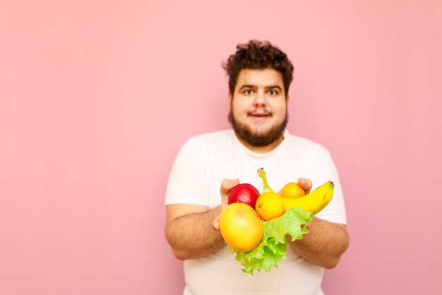 Funny toast isolated on pink background with fruits diet concept Copy space