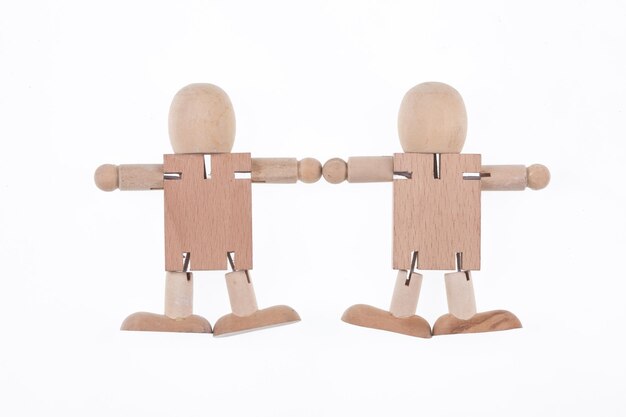 funny toy wooden man isolated on white background