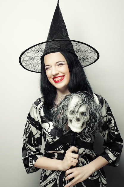 Funny Witch with skull.  Holiday picture.