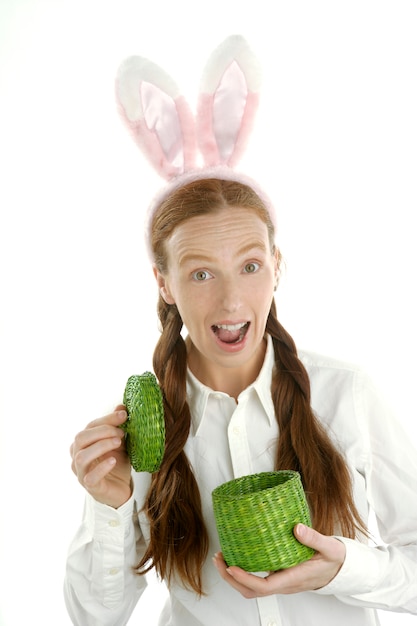 Photo funny woman holding gift with rabbit ears