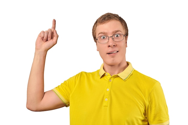 Funny young guy in corrective glasses and yellow Tshirt with eureka gesture man got idea isolated