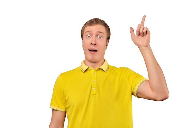 Funny young guy in yellow Tshirt with eureka gesture man got idea isolated white background