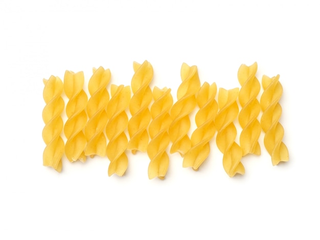 Fusilli pasta isolated on white. Top view