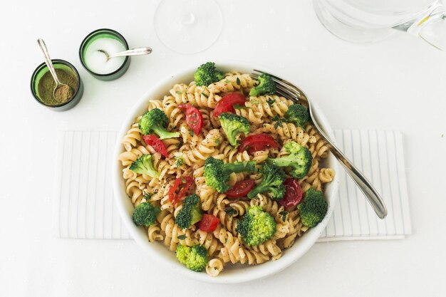 fusilli pasta salad with tomato broccoli napkin 2 High quality beautiful photo concept