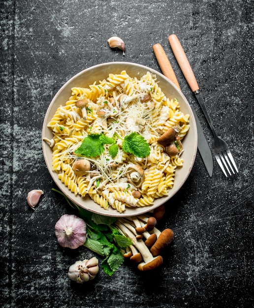 Fusilli pasta with mushrooms garlic and mint leaves