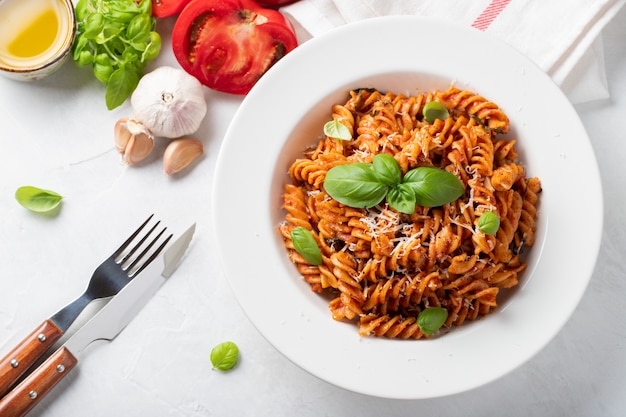 Fusilli pasta with tomato sauce.