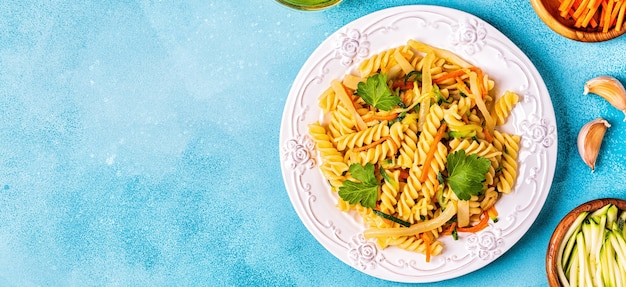 Fusilli pasta with zucchini and carrots