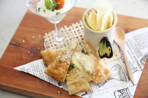 Fusion food roti with cheese and potato chips