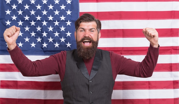 For the future. happy celebration of victory. Bearded hipster man being patriotic for usa. American education reform in july 4. American citizen at USA flag. american citizen in the election.