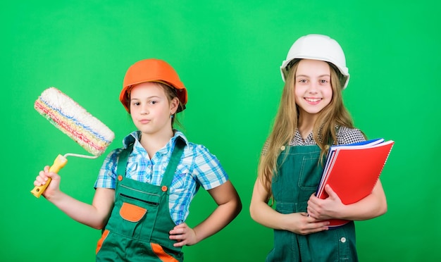 Future profession Kids girls planning renovation Initiative children provide renovation their room green background Amateur renovation Dreaming about new playroom Home improvement activities