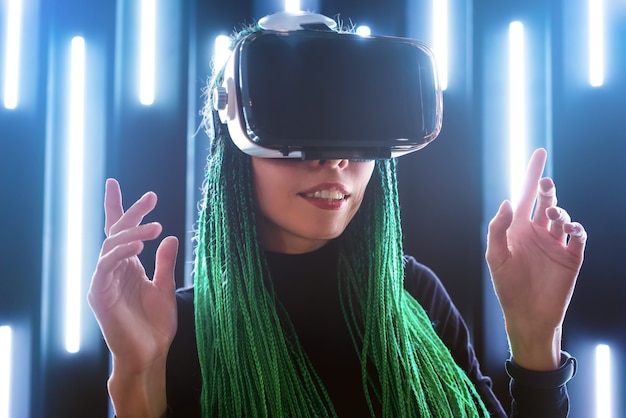 Futuristic girl with virtual reality headset