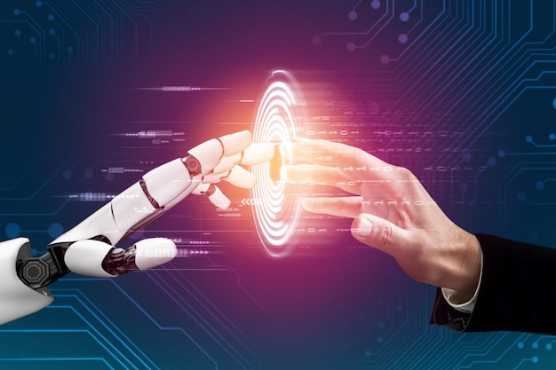 Futuristic robot touching a human hand