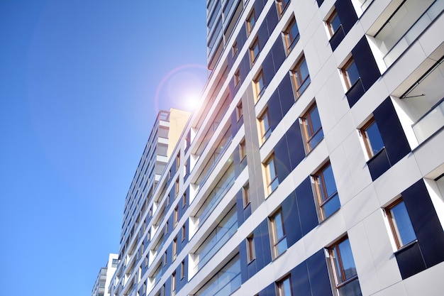 Futuristic square architecture of apartment building real estate with panoramic windows