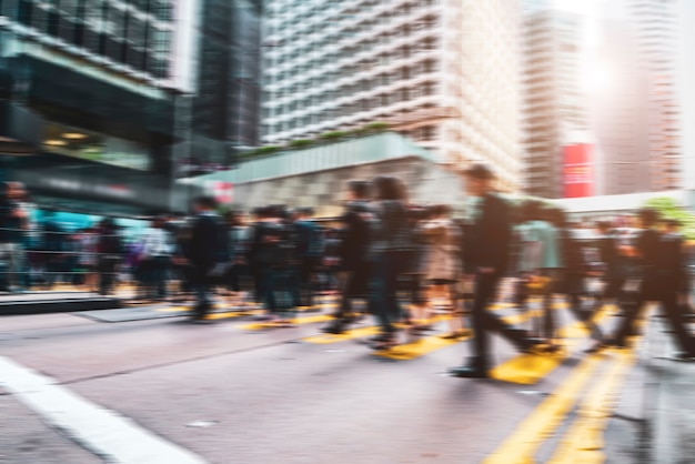 Photo fuzzy urban streets and pedestrians in central hong kong