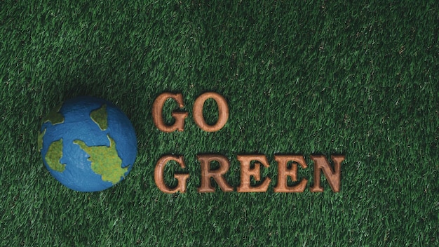Foto ga groen en red de wereld met milieuvriendelijke inspanningen. de boodschap go green-brieven opgesteld om ecobewustzijn voor een duurzame toekomst te promoten met biophilc design-achtergrond gyre