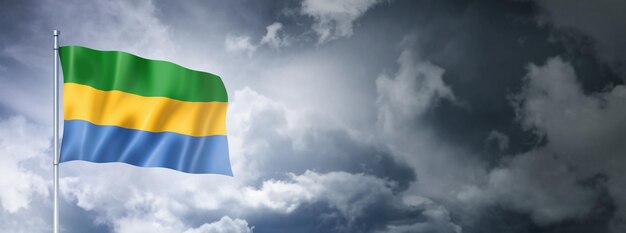 Gabonese flag on a cloudy sky