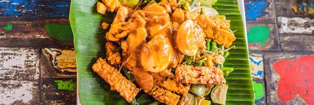 Gadogado indonesian salad served with peanut sauce ingredients tofu spinach string beans soy sprouts