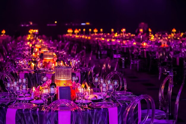 Gala dinner preparation tables decorated with candles