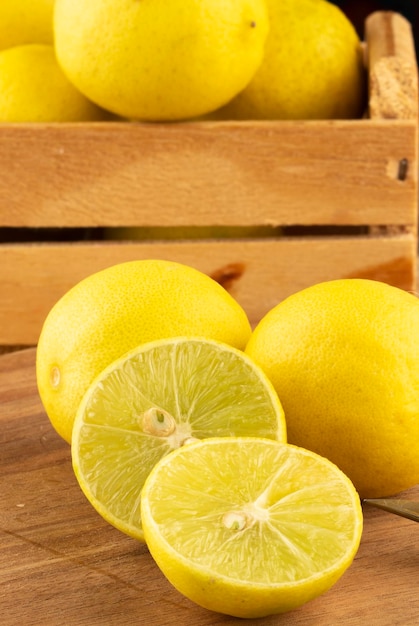 Galego lemons on cutting board Selective focus