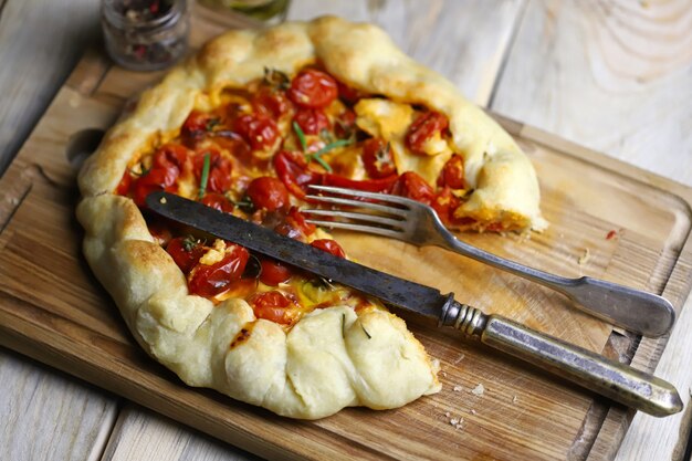 Galette with cherry tomatoes and cheese