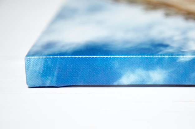 gallery wrap photo printed on glossy canvas and stretched on stretcher bar lateral side closeup