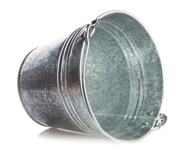 Galvanized metal bucket on a white surface