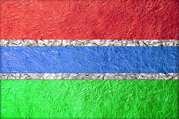 gambia flag made form foil texture background