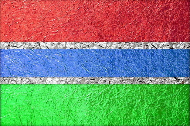 Photo gambia flag made form foil texture background