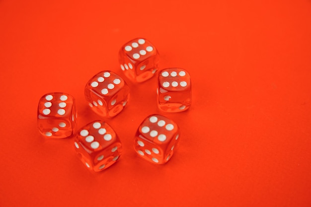 Gamble dices isolated on red.