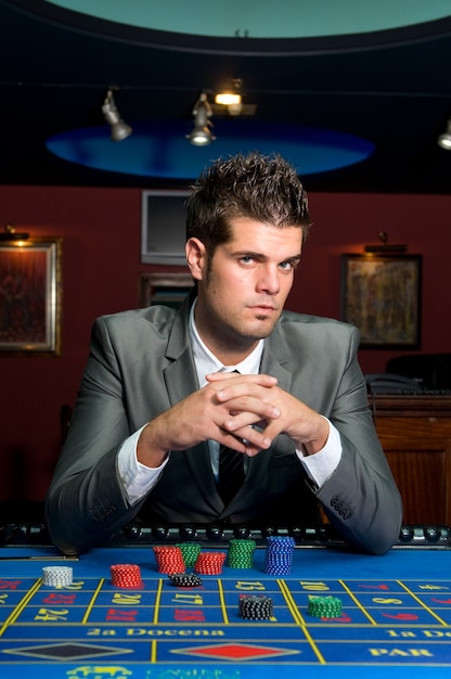 gambler man at the casino tables