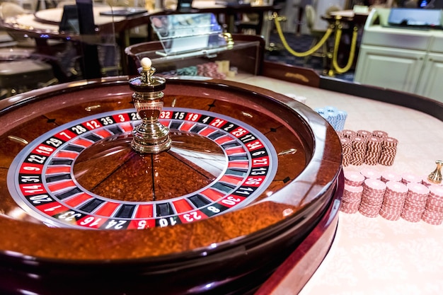 Gambling chips on a game table roulette